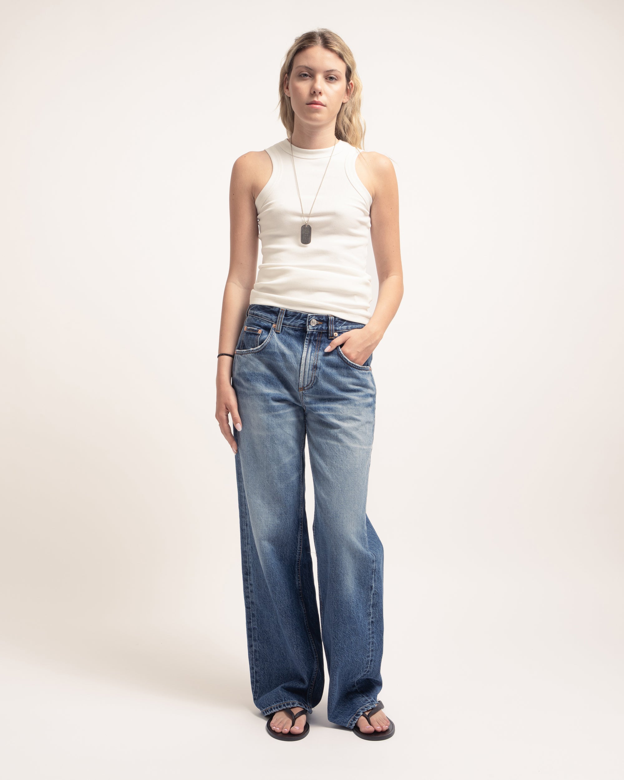 Pop jeans gamba ampia in denim fermo